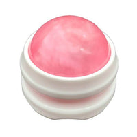 Boule de massage rose à base blanche, un accessoire pratique pour réaliser un auto-massage en profondeur
