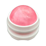 Boule de massage rose à base blanche, un accessoire pratique pour réaliser un auto-massage en profondeur