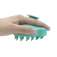 Brosse à shampoing avec picots en silicone tenue en main pour une prise en main facile