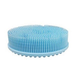Brosse sensorielle de forme ronde, en silicone bleu, dotée de picots souples.