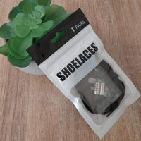 Embouts métalliques pour lacets élastiques présentés dans un emballage “Shoelaces”, prêts à l’emploi