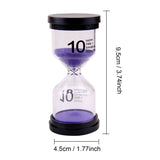 Sablier violet de 10 minutes présentant ses dimensions (9,5 cm de haut par 4,5 cm de large), idéal pour chronométrer de courtes activités