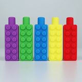 Lot d'embouts à mâchouiller brique, cinq couleurs (violet, vert, bleu, jaune et rouge)