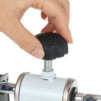 Gros plan sur le bouton de réglage de résistance du pédalier