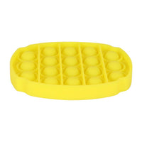 Press-in bubble ovale jaune avec bulles pop en silicone