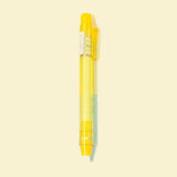 Stylo gomme jaune transparent vu de face 