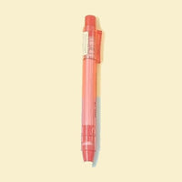 Stylo gomme rouge transparent vu de face