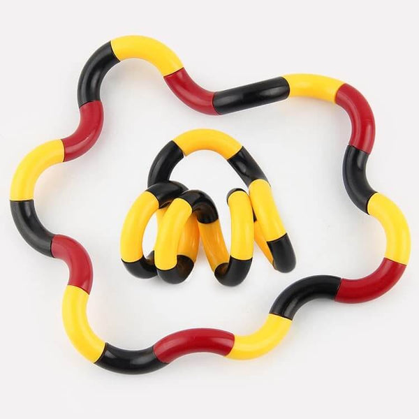  Tortillon flexible en rouge, jaune et noir, montré en version dépliée et enroulée au centre 