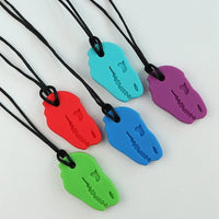 colliers à mâcher tête de dinosaure toute les couleurs